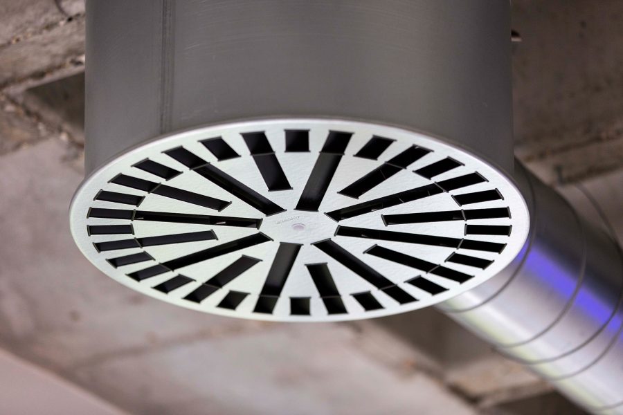 Exposed air conditioning system for a contemporary industrial space in London