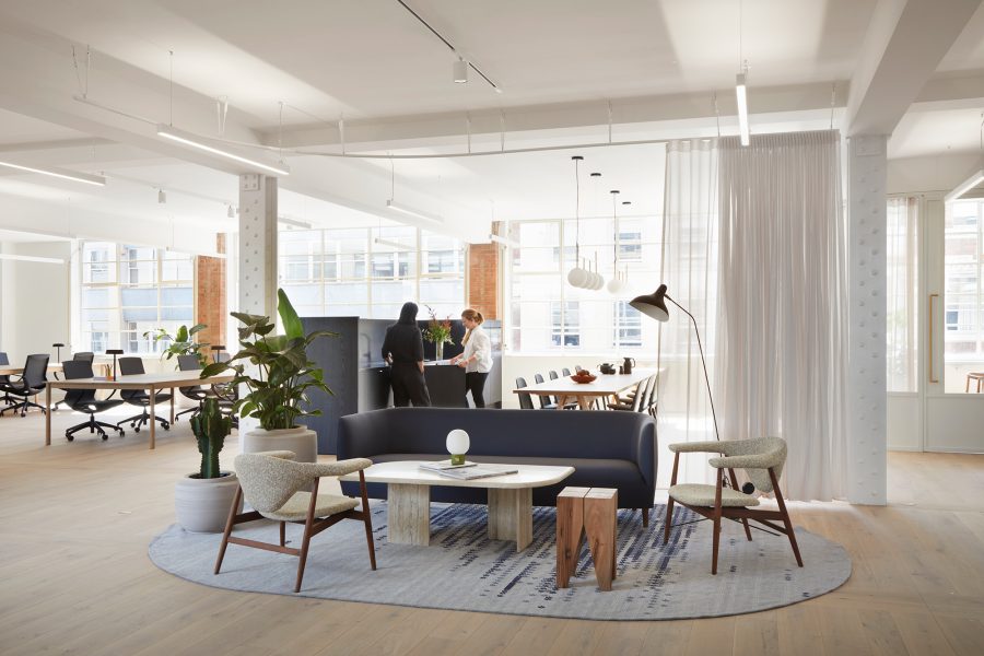 People in a modern break-out area, in a new office development, at Hatton Garden area.