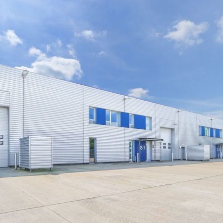 Industrial refurbishment works on unit 35.9/35.10 cobalt Woolwich, with blue sky.